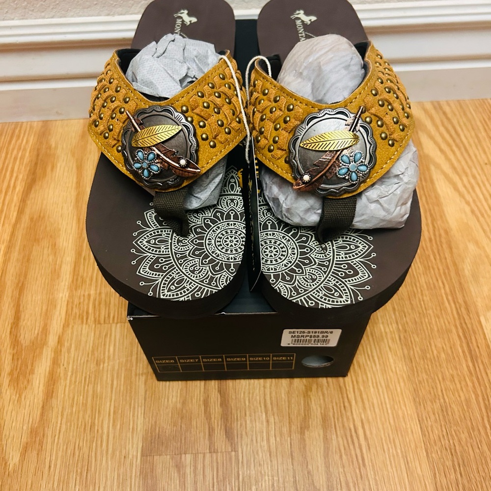 Montana West feather and flower flip flops
